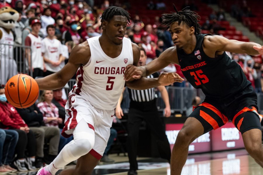 WSU+guard+TJ+Bamba+%285%29+dribbles+around+Oregon+State+forward+Glenn+Taylor+Jr.+%2835%29+during+the+second+half+of+an+NCAA+college+basketball+game+in+Beasley+Coliseum%2C+March+3.