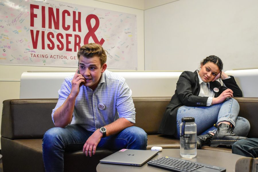 Surrounded by campaign members and friends, Kjelt Visser receives a call from ASWSU Vice President Alexander Pan at 8 p.m. Wednesday in a collaboration room in The Spark: Academic Innovation Hub. Visser and his running mate, Sydney Finch, right, lost the ASWSU election by about 200 votes.