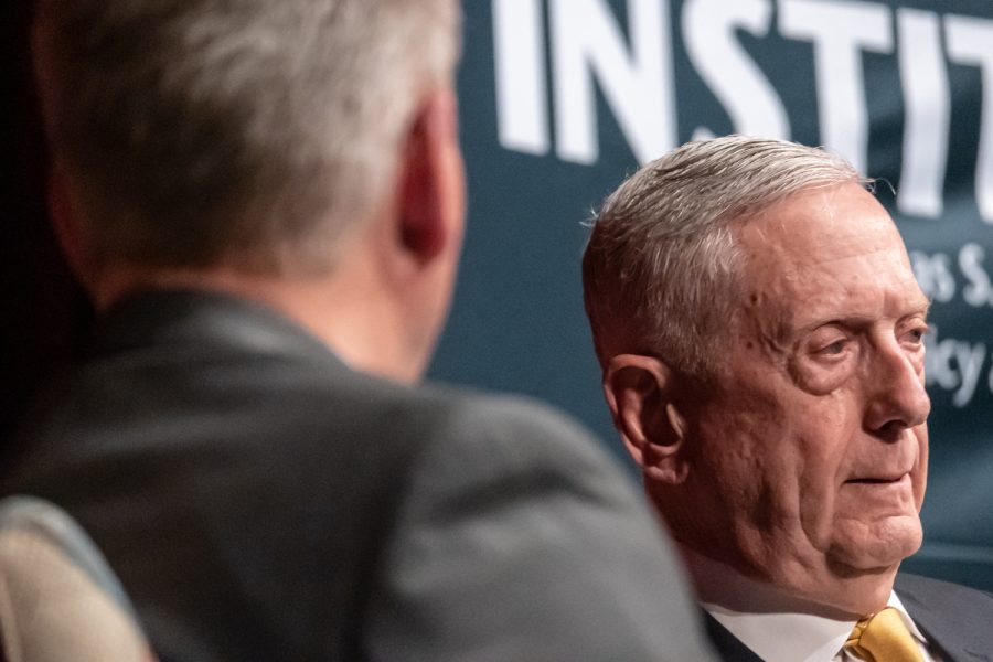 James Mattis (right), former U.S. Secretary of Defense, answers questions from Cornell Clayton (left), director of Thomas S. Foley Institute for Public Policy and Public Service, at Democracy at home and abroad, March 24, in Bryan Hall Auditorium.