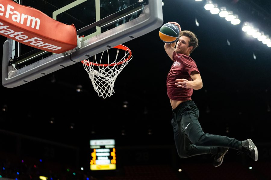 Members of the Utah Jazz Dunk Team put on a show during halftime of an NCAA college basketball game against Oregon in Beasley Coliseum, March 5.