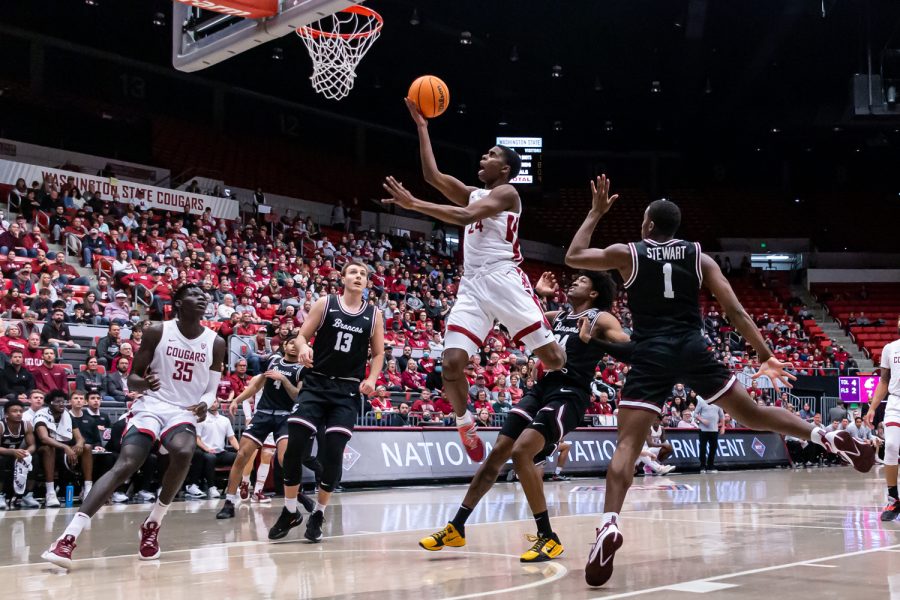 WSU guard Noah Williams jumps for a layup during the first half of an NIT first round matchup against Santa Clara, March 15, in Beasley Coliseum.