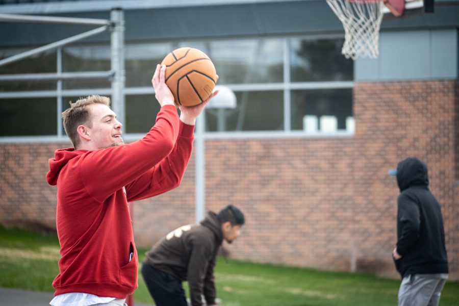 Vaughn Drewien shoots a basketball at the Threes for 3 chariety event for Hilinskis Hope on April 9, 2022. Drewien planned the event along with six other Sports Managment seniors in April.