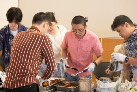 Students are served food at the Filipino Culture Night, March 10.