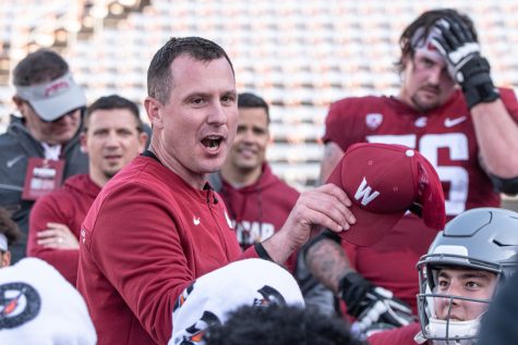 WSU head coach Jake Dickert speaks to his players after the 2022 Spring Game, April 23, at Martin Stadium.