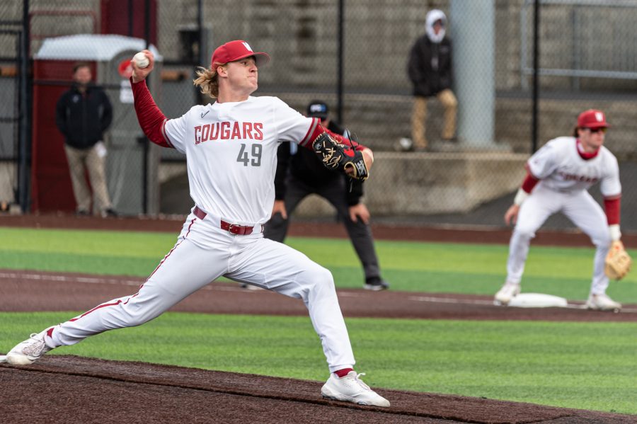WSU+pitcher+Duke+Brotherton+throws+a+pitch+during+an+NCAA+collegiate+baseball+game%2C+April+2%2C+at+Bailey-Brayton+Field.
