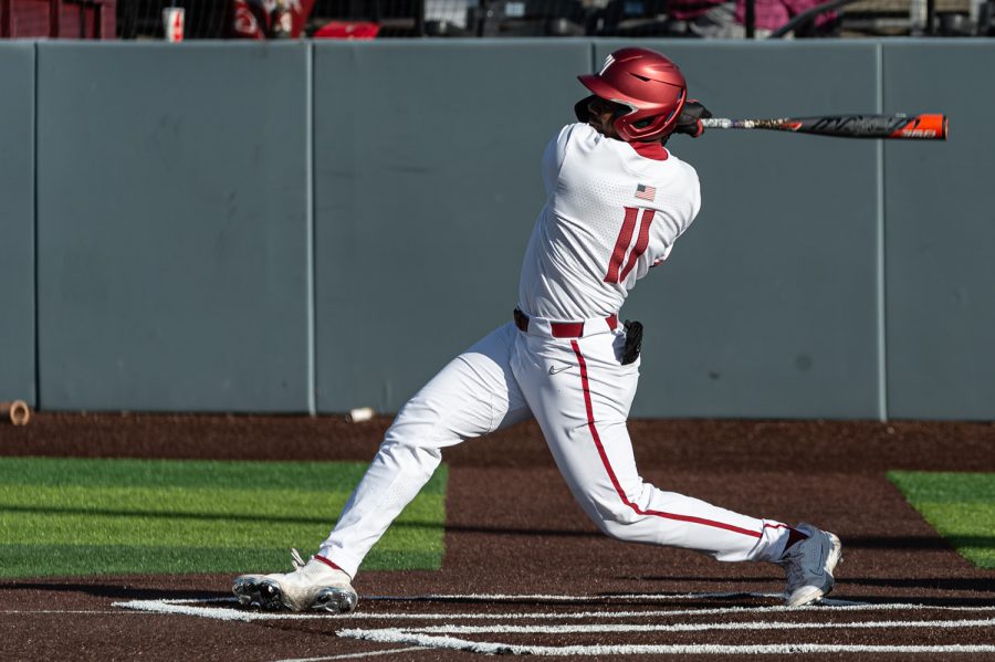 WSU outfielder Keith Jones II swings at a pitch during an NCAA collegiate baseball game, April 2, at Bailey-Brayton Field.