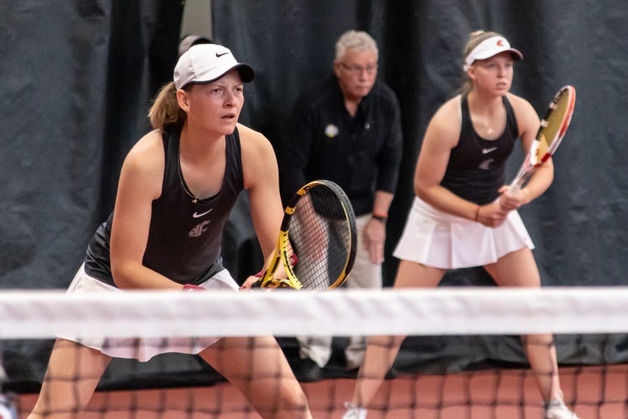 Michaela Bayerlova (left) and Maxine Murphy (right) prepare for an incoming serve during an NCAA collegiate tennis match against Stanford, April 10.