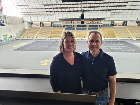 Jill and Matt McCluskey pose in front of the Lauren McCluskey Track on July 14 in the Kibbie Dome.