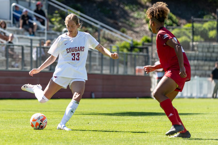 WSU midfielder Jenna Studer passes the ball during an NCAA womens soccer game against EWU, Aug. 28, at Lower Soccer Field.