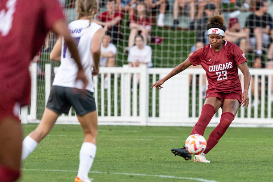 WSU defender Mykiaa Minniss passes the ball during an NCAA womens soccer match against Portland, Aug. 25, at Lower Soccer Field.