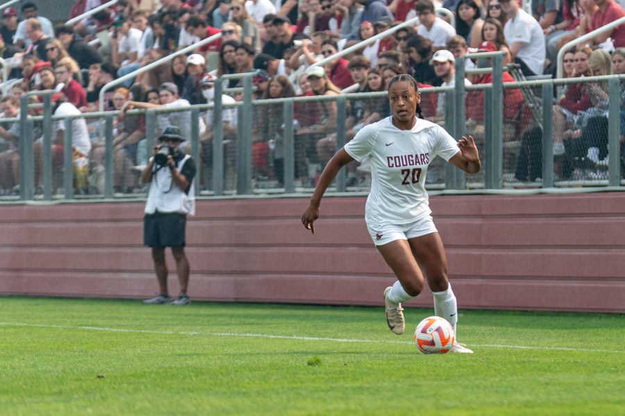 WSU defender Aaqila McLyn dribbles downfield during an NCAA womens soccer game against Cal Poly, Sep. 11, at Lower Soccer Field.