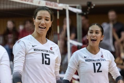 WSU middle blocker Magda Jehlarova (15) and setter Argentina Ung (12) celebrate after a point during an NCAA womens volleyball match against California Baptist, Sept. 1, at Bohler Gymnasium.
