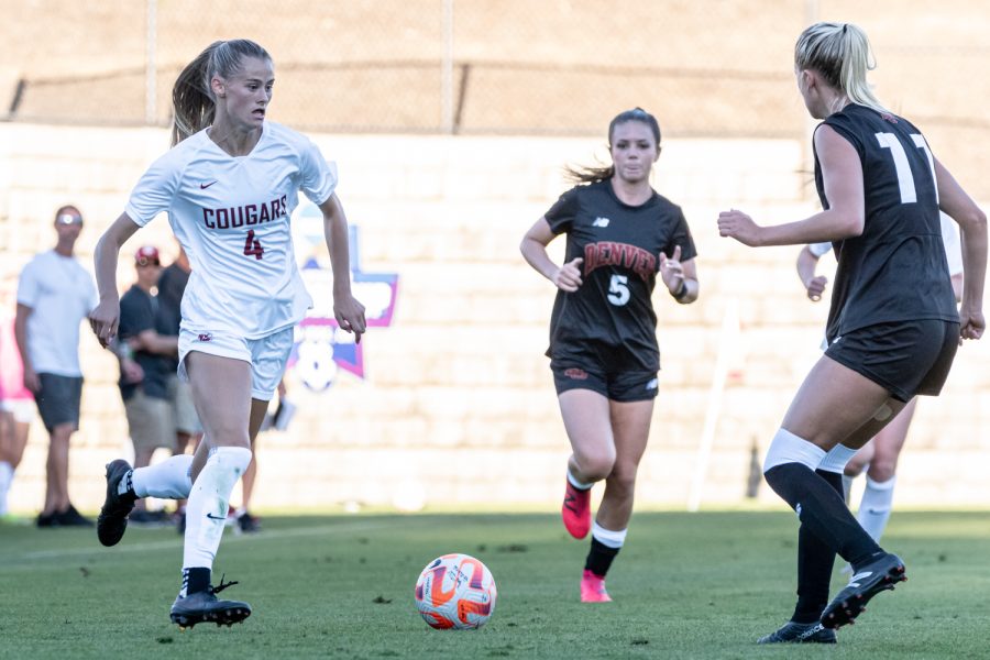WSU forward Grayson Lynch dribbles downfield during an NCAA womens soccer match against Denver, Sep. 4, at Lower Soccer Field.