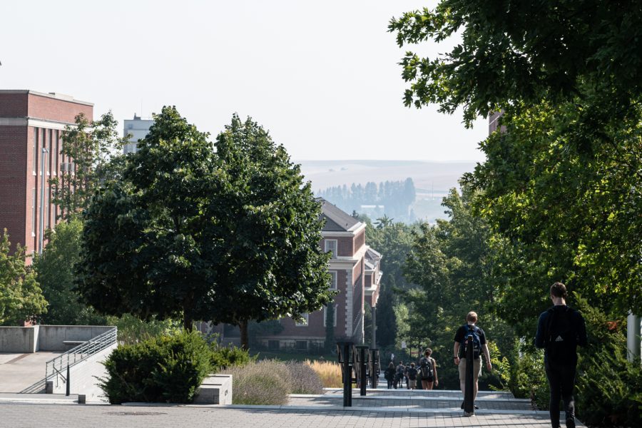 Students walk to and from classes in hazy weather, Sep. 6.