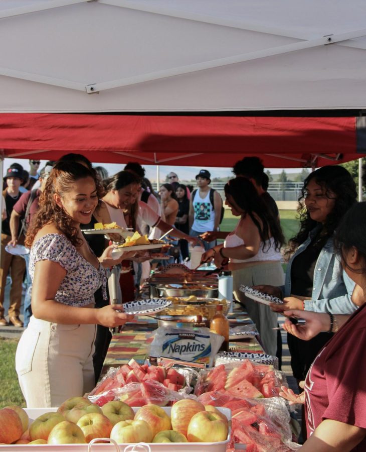 Students gathered on top of Terrell Library Atrium to share food and culture with each other.