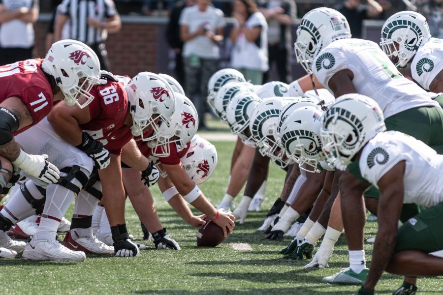 The WSU offense and the Colorado State defense line up during an NCAA college football game, Sep. 17.