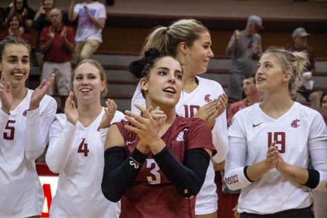 The WSU womens volleyball team celebrates after defeating CSU Bakersfield in an NCAA volleyball match, Sep. 2.