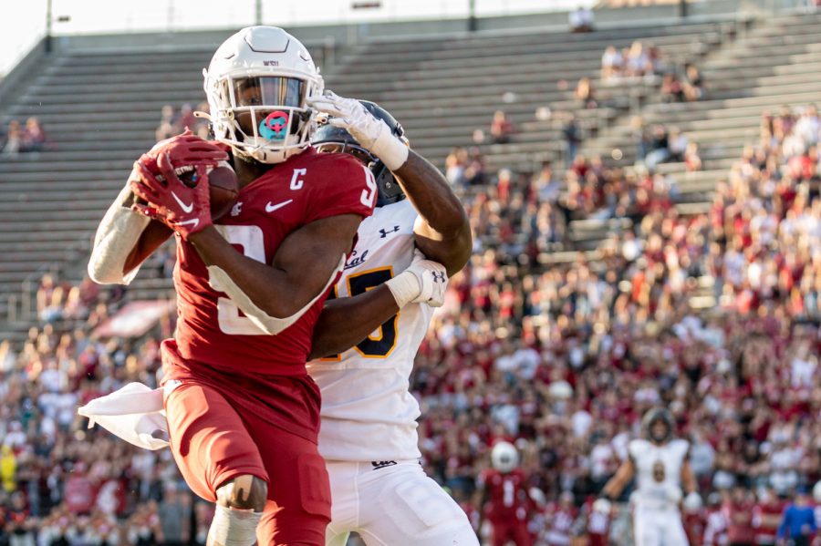WSU wide receiver Renard Bell catches a touchdown pass from quarterback Cameron Ward during an NCAA football game against California, Oct. 1.