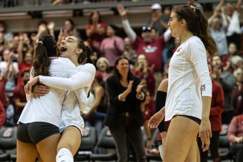 The WSU volleyball team celebrates winning a set during an NCAA volleyball game against Oregon, Oct. 7, 2022, in Pullman, Wash. 