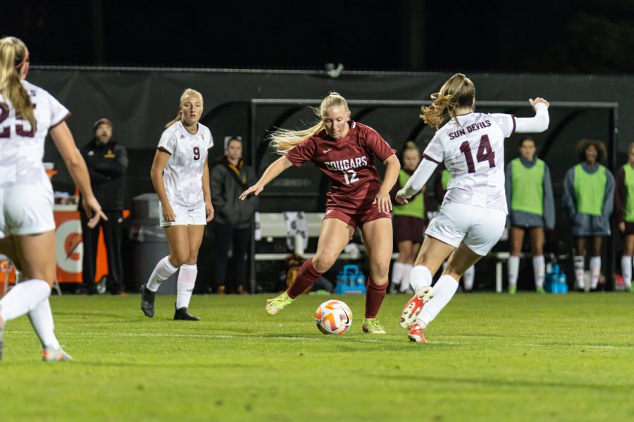 WSU midfielder Lindsey Turner passes the ball during an NCAA soccer match against Arizona State, Oct. 20.