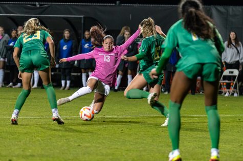 WSU forward Brianna McReynolds battles for the ball during an NCAA womens soccer match against Oregon, Oct. 14.