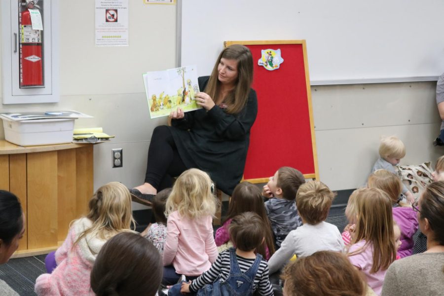 Rachael Ritter reads to young children as Mother Goose twice a week at Neill Public Library.
