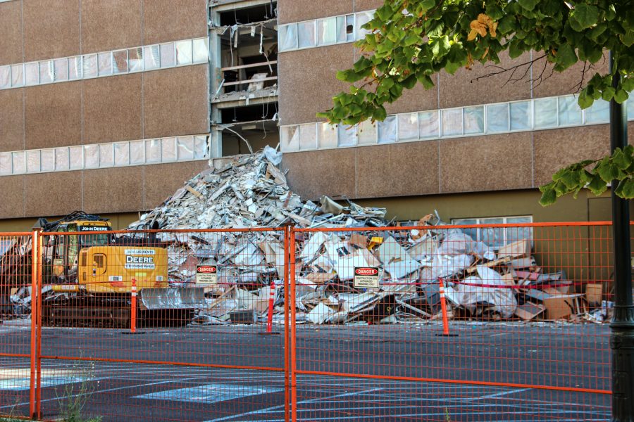 Construction workers demolish Johnson Hall, Oct. 4.