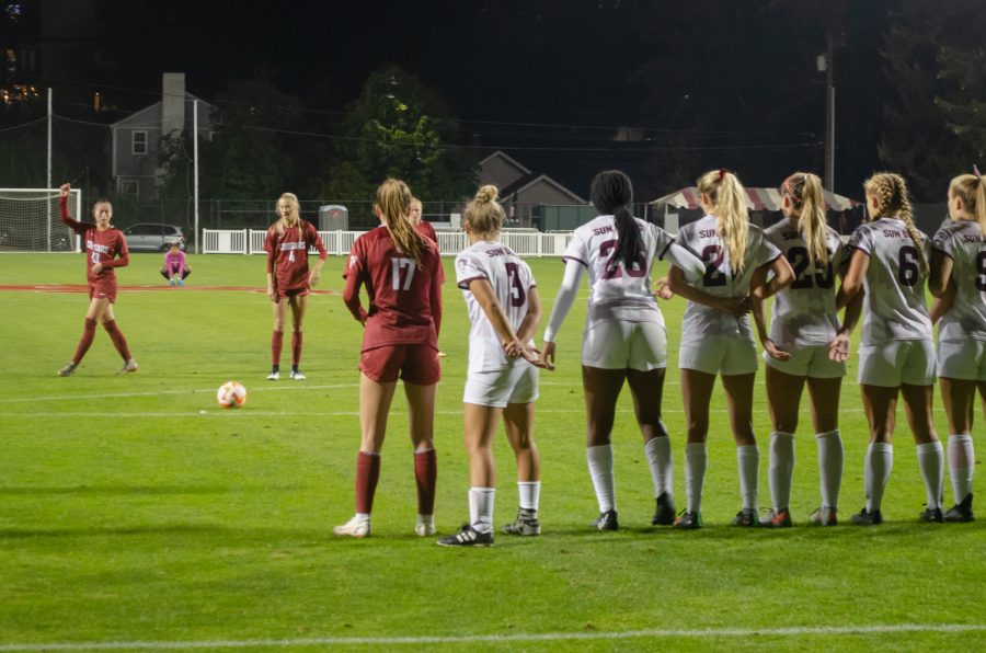 The WSU soccer team prepares for a free kick during an NCAA soccer match against Arizona State, Oct. 20.