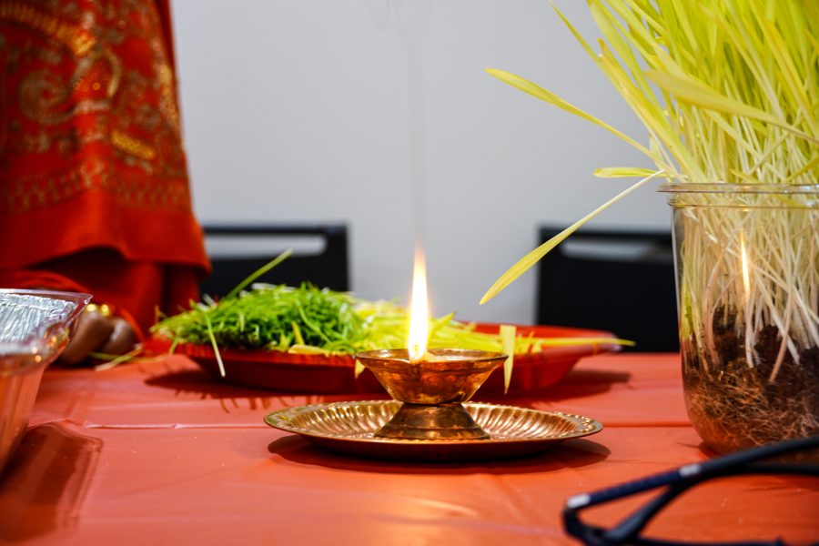 A diya is lit to protect from negative entities, Oct. 9.