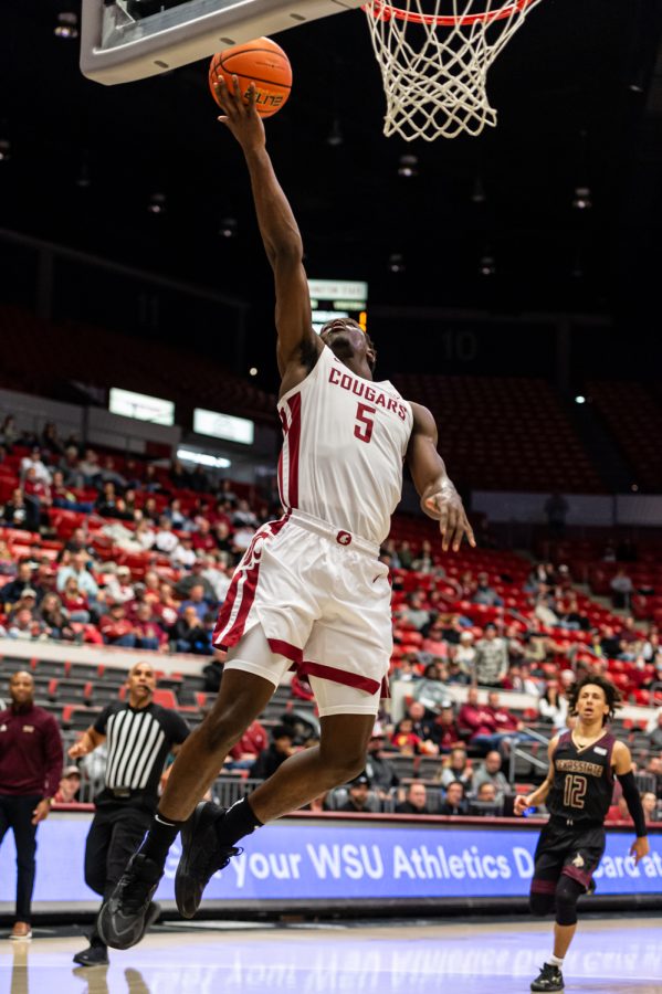 WSU guard TJ Bamba jumps for a lay-up during an NCAA mens basketball game against Texas State, Nov. 7.