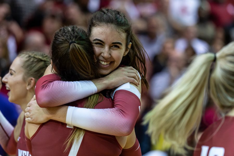 WSU outside hitter Pia Timmer (left) and opposite Katy Ryan (right) celebrate after sweeping UW, Nov. 25.