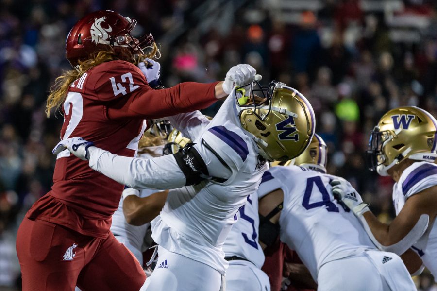WSU tight end Billy Riviere III throws a block during the Apple Cup, Nov. 26.