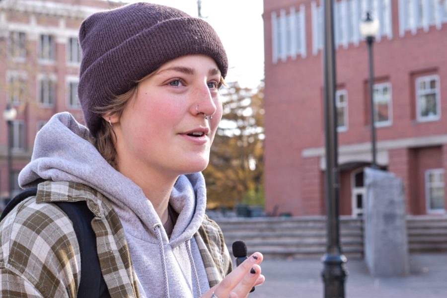 Grace Couey, sophomore wildlife and ecology major discusses favorite rock bands outside the CUB, Nov.15.