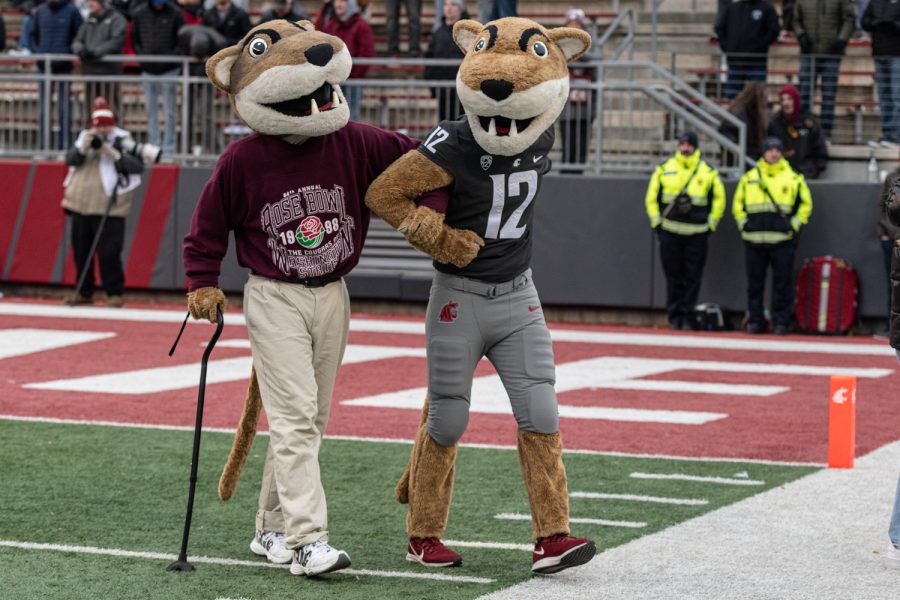 Butch T. Cougar and Papa Butch walk around the field during an NCAA football game against Arizona State, Nov. 12.