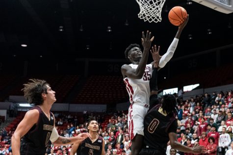 WSU forward Mouhamed Gueye jumps for a layup during an NCAA mens basketball game against Texas State, Nov. 7.