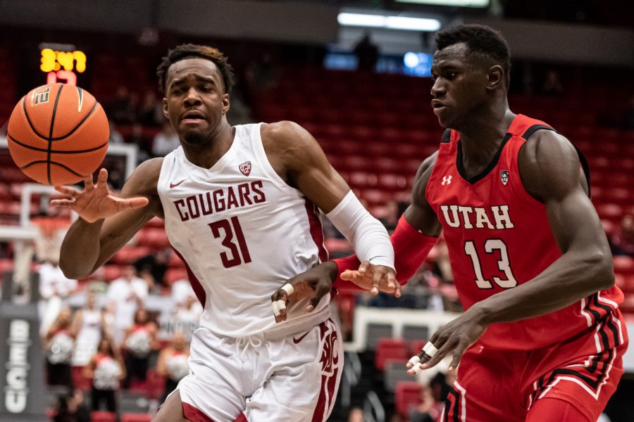 WSU guard Kymany Houinsou loses the ball during an NCAA mens basketball game against Utah, Dec. 4.