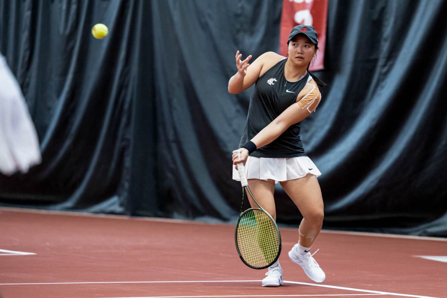 WSU tennis player Yang Lee hits the ball during an NCAA match against Montana, Jan, 13.