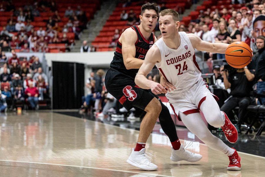 WSU+guard+Justin+Powell+dribbles+the+ball+during+an+NCAA+basketball+game+against+Stanford%2C+Jan.+14.