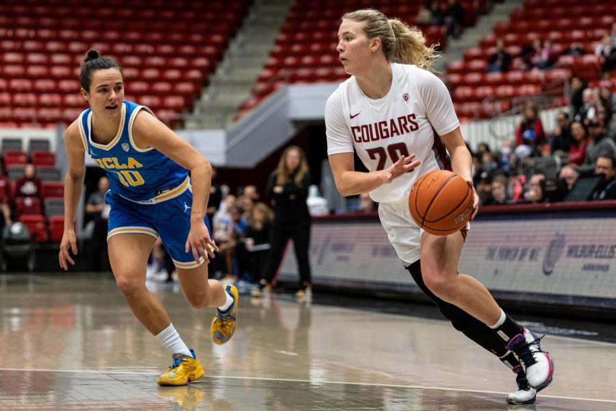WSU guard Grace Sarver looks for a pass during an NCAA basketball game against UCLA, Jan. 22.