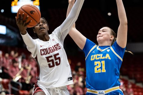 WSU center Bella Murekatete jumps for a layup during an NCAA basketball game against UCLA, Jan. 22.