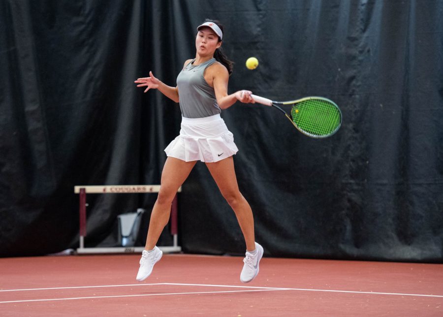 WSU tennis player Elyse Tse hits the ball during an NCAA tennis match against Gonzaga, Jan 22.