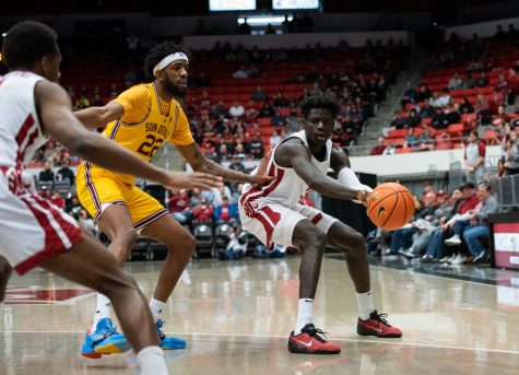 WSU center Mouhamed Gueye passes the ball during an NCAA men’s basketball game against ASU, Jan 28.