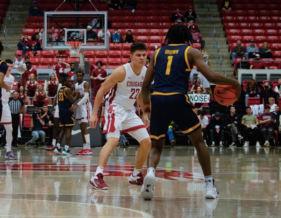 WSU guard Dylan Darling defends against California guard Joel Brown during a NCAA men’s basketball game against California Jan 11th.