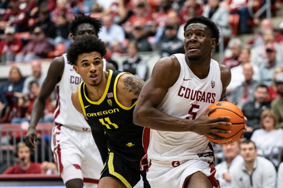 WSU guard TJ Bamba drives to the hoop during an NCAA basketball game against Oregon, Feb. 19, 2023, in Pullman, Wash.