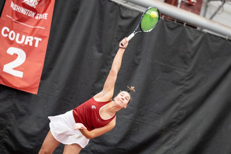 Eva Alvarez Sande serves the ball during a tennis match against Eastern Washington, Feb. 24, 2023, in Pullman, Wash.