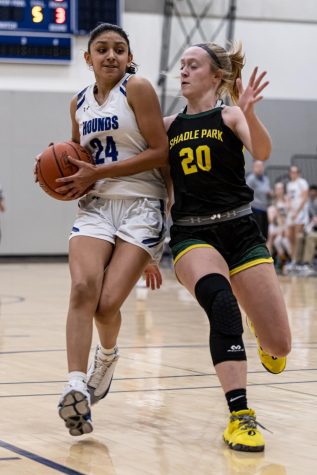 Pullman guard Suhailey Reyes drives toward the hoop during a basketball district playoff game against Shadle Park, Feb. 14, 2023, in Pullman, Wash.