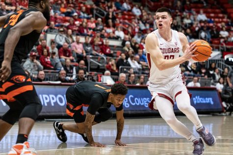WSU forward Andrej Jakimovski drives to the hoop during an NCAA basketball game against Oregon State, Feb. 16, 2023, in Pullman, Wash.