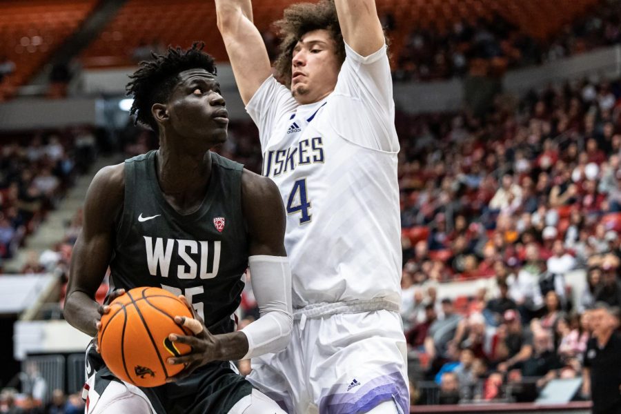 WSU+forward+Mouhamed+Gueye+drives+to+the+hoop+during+an+NCAA+basketball+game+against+UW%2C+Feb.+11%2C+2023%2C+in+Pullman%2C+Wash.