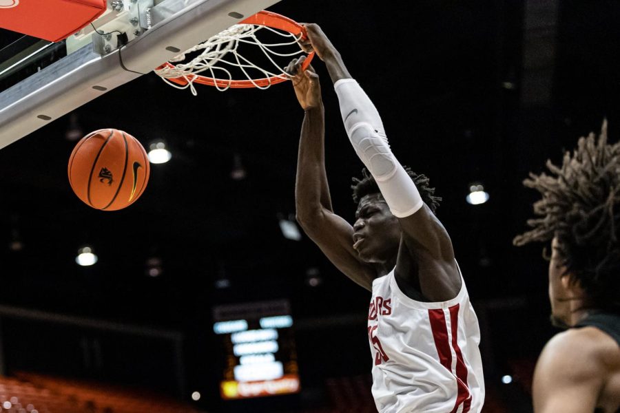 WSU forward Mouhamed Gueye dunks the ball during an NCAA basketball game against Oregon State, Feb. 16, 2023, in Pullman, Wash.