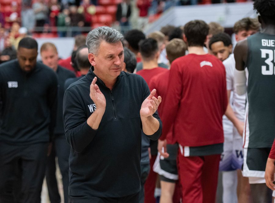 WSU men’s basketball head coach Kyle Smith celebrates after winning the NCAA basketball game against UW, Feb. 11, 2023, in Pullman, Wash.